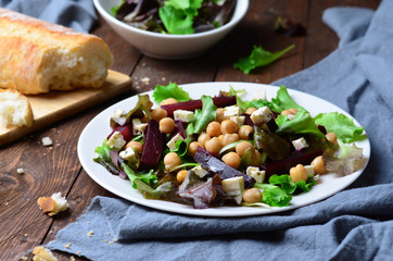 Beetroot and Chickpea Salad on Wooden Background