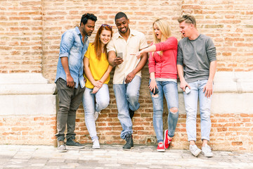 Best multi race friends watching videos surprised on smartphone