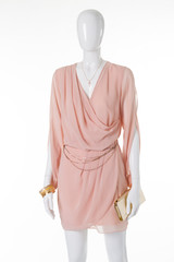 Light chiffon dress on a mannequin.