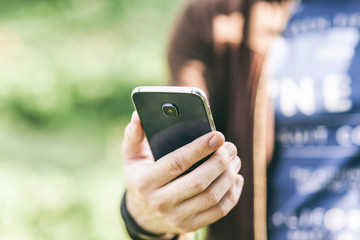Close up of a man using mobile smartphone
