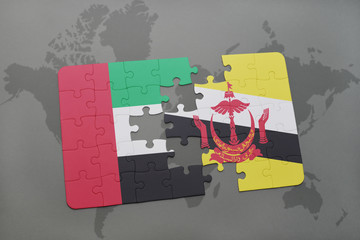 puzzle with the national flag of united arab emirates and brunei on a world map background.