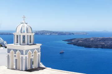 Fototapeta na wymiar Blue church in Thira town on Santorini island in Greece