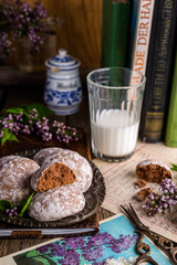 Still, gingerbread, milk, books, table, glass, flowers, a plate