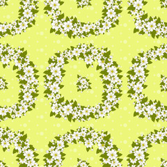 Seamless pattern - a wreath of flowers and leaves.