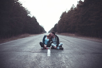 Boy and girl on a road