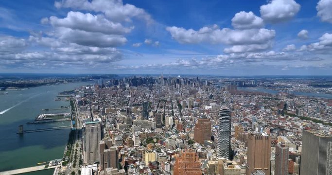 A unique high-angle time lapse view of New York City with the Empire State Building in the distance.  	