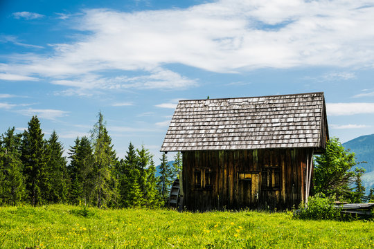 Small wodden cabin at a mountain paisture