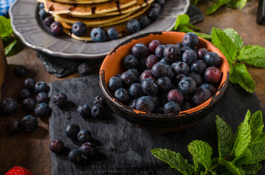American pancakes with berries and chocolate