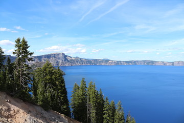 Crater Lake And Light Blue Sky 
