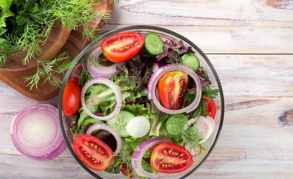 vegetable salad on a wooden background