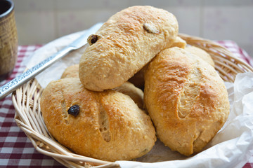 Home made whole wheat bread with raisins in the basket
