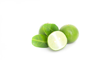 Lime with half and leaves isolated on white background