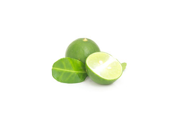 Lime with half and leaves isolated on white background