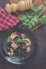 Black spaghetti with shrimps and sausage