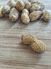 peanuts on wooden table