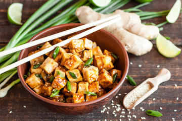 Fried tofu with sesame seeds and spices - obrazy, fototapety, plakaty
