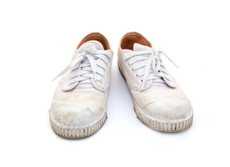 dirty sneakers isolated on a white background