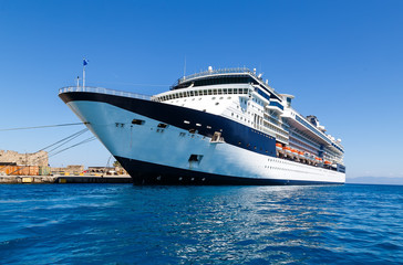 Fototapeta na wymiar Cruise liner next to Rhodes sea coast, Greece