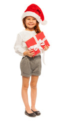 Portrait of girl with big present and Santa hat