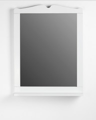 Mirror on the white wall
