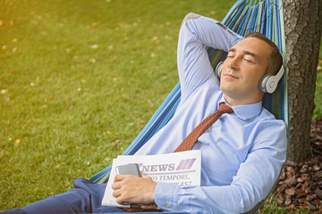 Relaxed businessman resting after work