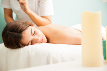 Fototapeta na wymiar Lomi lomi massage at a health spa