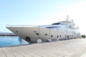 luxury yacht parked at dock - obrazy, fototapety, plakaty