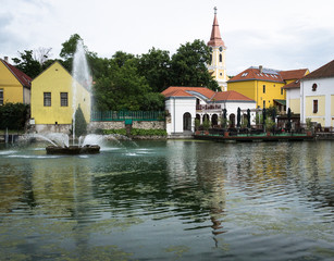 A reflection of the city in a pond