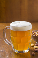 Glass Mug with Beer and Snacks