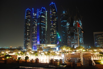 City view with fountains by night, capital of Arab Emirates