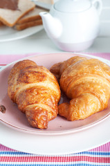 Sunday breakfast. Croissants with tea and peanut butter.
