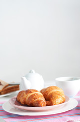 Sunday breakfast. Croissants with tea and peanut butter.