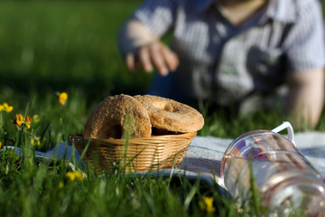 Shortbread cookies in a wicker basket on a background of baby 