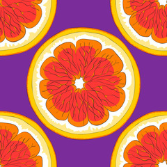 Grapefruits on a purple background.