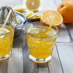 The cooled drink with fresh lemon and orange