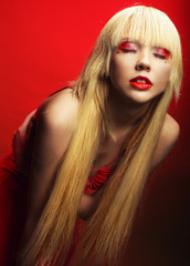 Fototapeta premium Perfect blond model in red dress