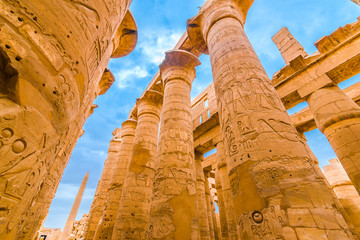 Great Hypostyle Hall and clouds at the Temples of Karnak (ancient Thebes). Luxor, Egypt - obrazy, fototapety, plakaty