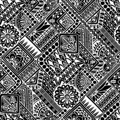 Seamless asian ethnic floral retro doodle black and white background pattern in vector. Henna paisley mehndi doodles design tribal black and white pattern.