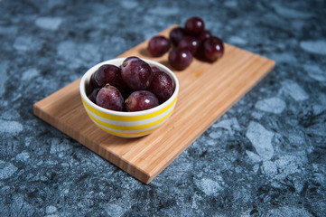 Fresh grape fruits on marble table. Flat lay.