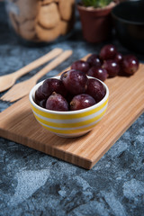 Fresh grape fruits on marble table. Flat lay.
