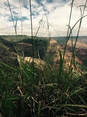 Scenic view in Kauai of mountains and waterfall