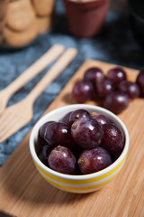 Fresh grape fruits on marble table. Flat lay.