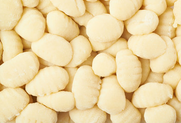 Surface covered with gnocchi - obrazy, fototapety, plakaty