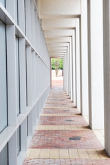 Fototapeta premium perspective view of corridor outside office building, vertical composition