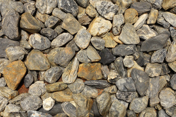 Crushed grey stone on the ground texture