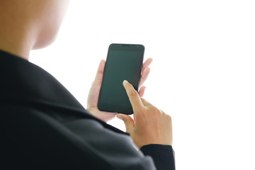 Woman holding a smartphone and touching the screen