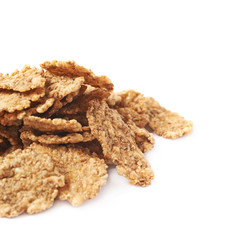 Pile of wholegrain cereal flakes isolated