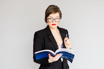 girl in a business suit and glasses