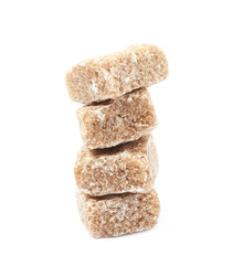 Pile of brown sugar cubes isolated