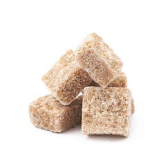 Pile of brown sugar cubes isolated